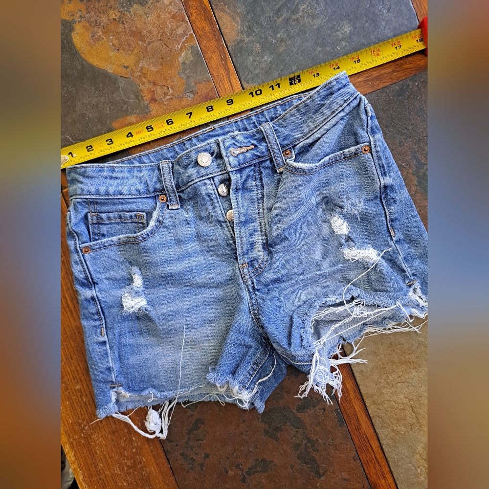 Old Navy Highrise blue denim shorts with a distressed, ripped look -- size 2